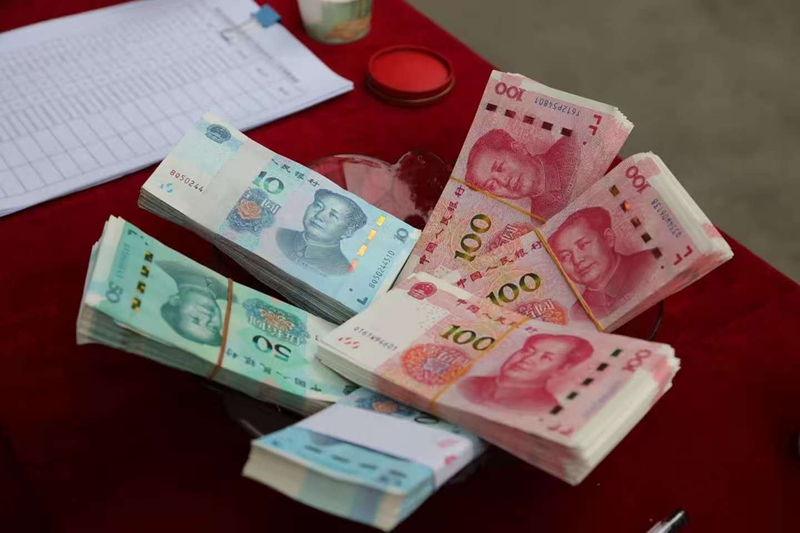 集體經濟促發展，分紅增收暖民心。吳竹彧攝