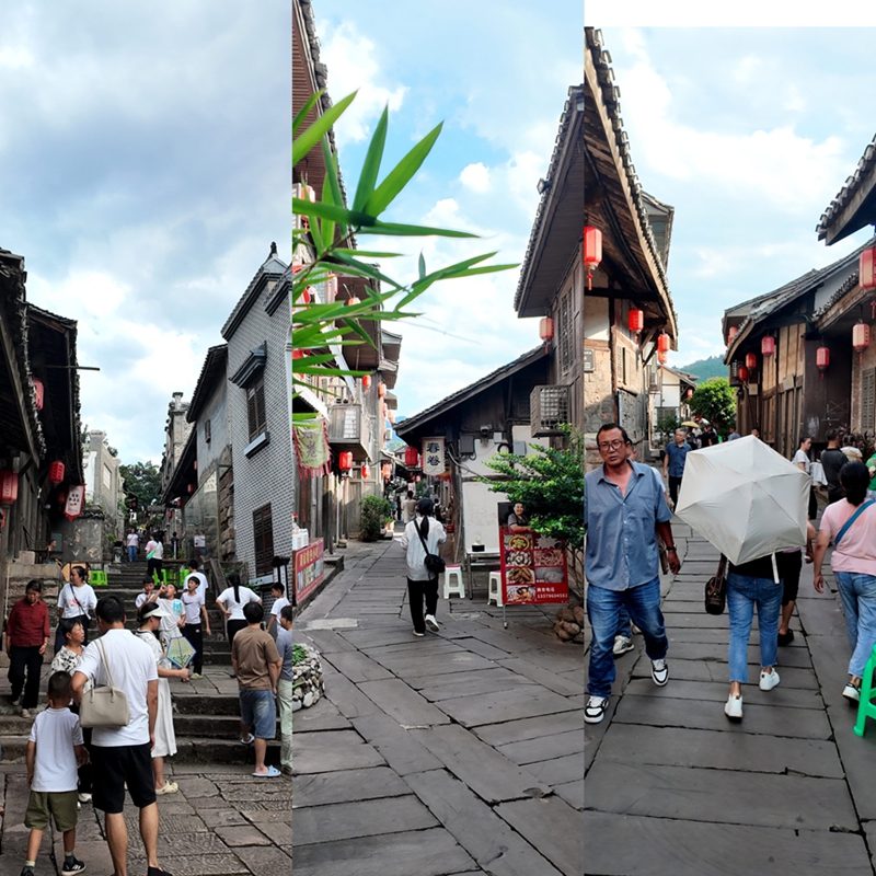 來自四川、重慶等地的游客，漫步古鎮，享受假日時光。姚瑤 攝.jpg